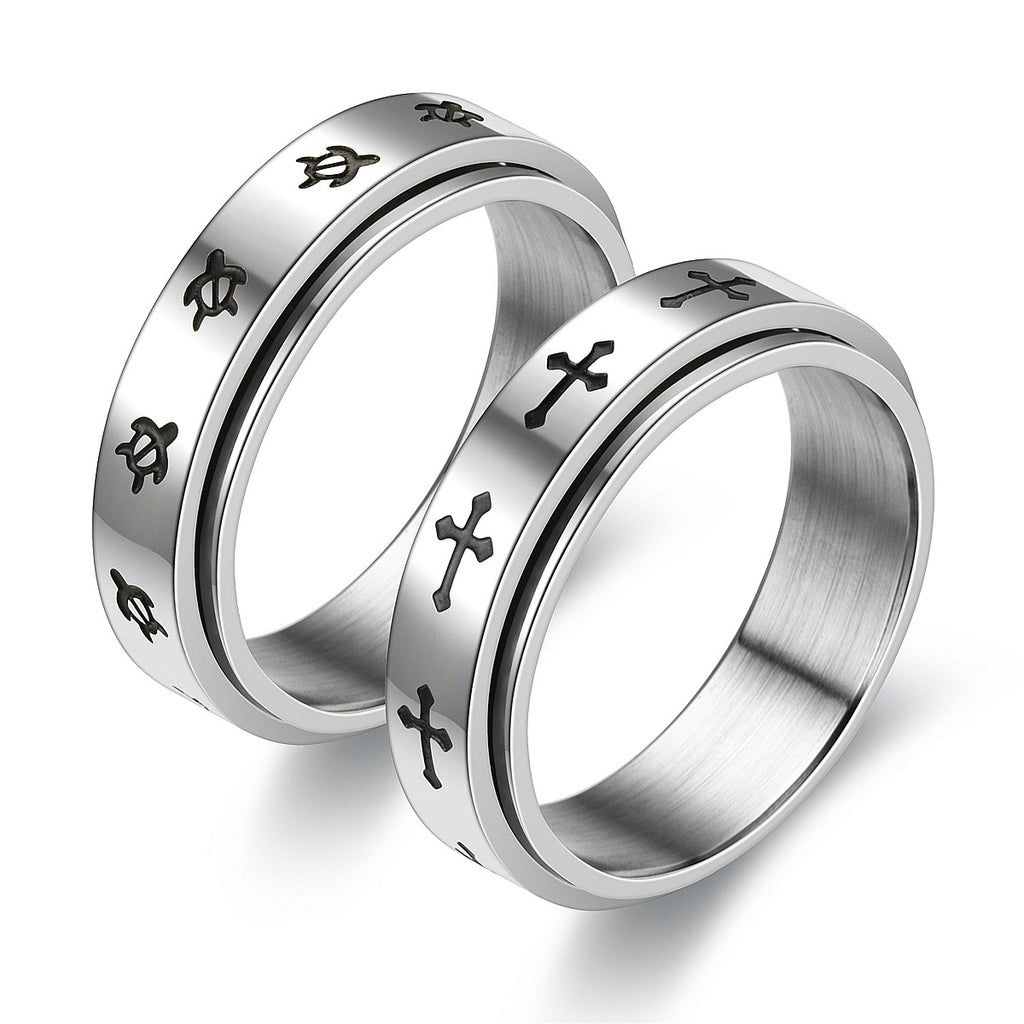 Anti-anxiety and stress-reducing rotating cross ring