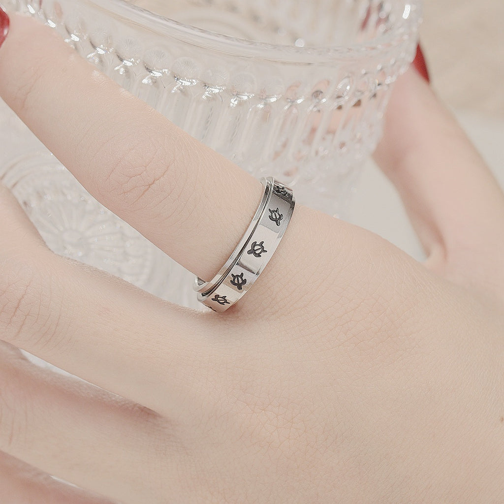Anti-anxiety and stress-reducing rotating cross ring