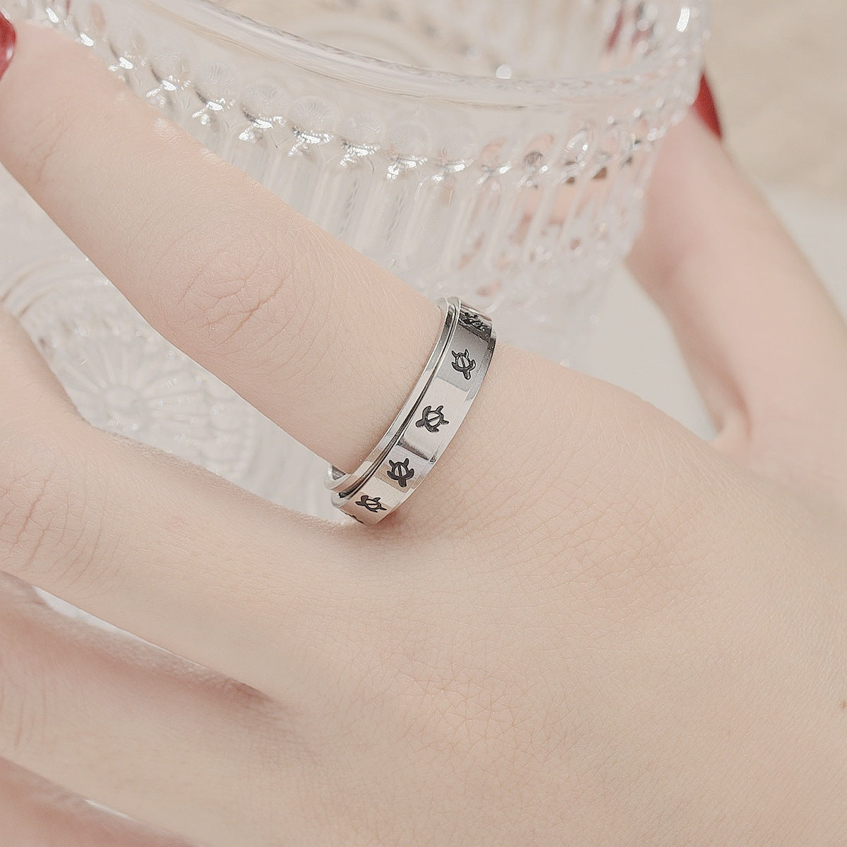 Anti-anxiety and stress-reducing rotating cross ring